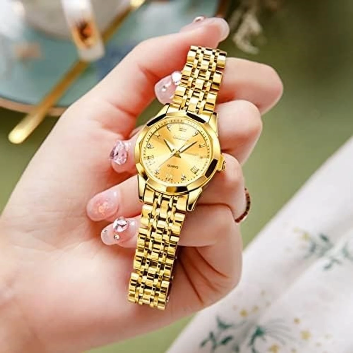 OLEVS MODEL 9931 FULL GOLDEN WOMEN WATCH PUSH LOCK + এক পিস ব্যাটারি ফ্রি।